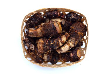 Organic taro fruit on white background.