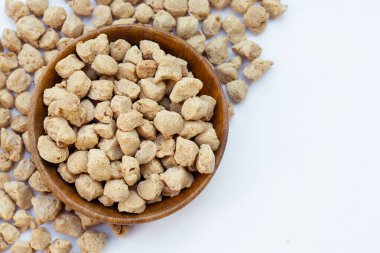 Textured soy protein on white background.