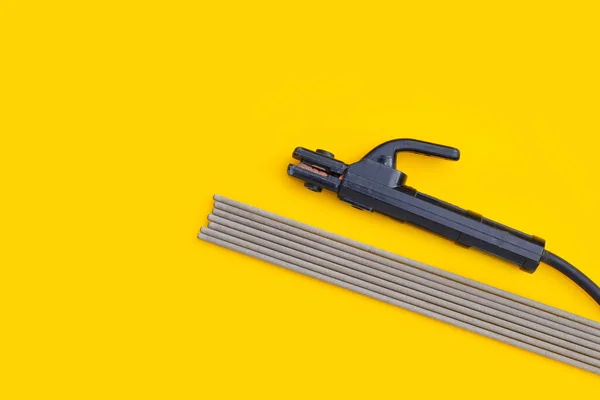 stock image Welding equipment on yellow background.