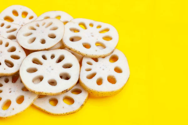 Lotus root on yellow background