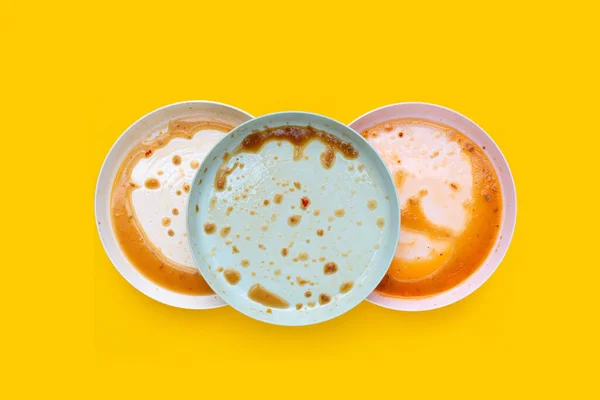 stock image Dirty dishes on yellow background. Top view