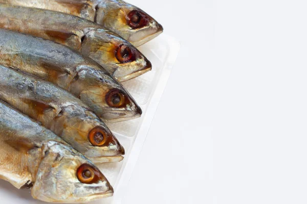 Salted fish on white background.