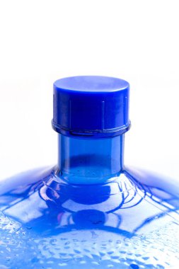 Big blue bottle of water on white background.