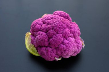 Purple cauliflower on dark background.