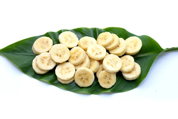 Banana slices on green leaves