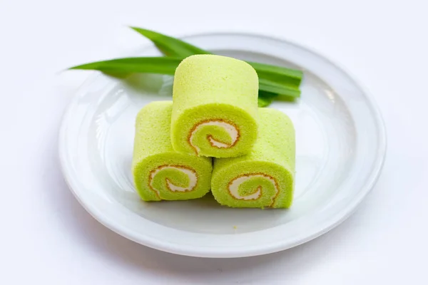 stock image Pandan roll cake on white background.