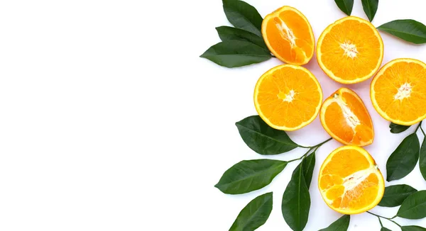 stock image Orange fruit with green leaves on white background.