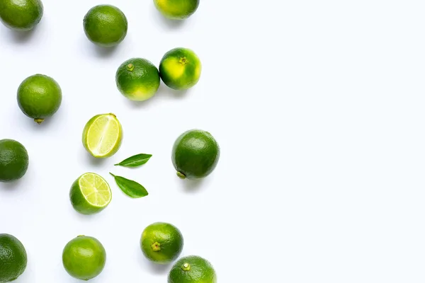 stock image Limes with leaves isolated on white background.