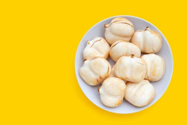 Toddy palm on yellow background.