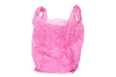 Beyaz arka planda pembe plastik torba. Boşluğu kopyala