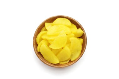 Japonya 'da Takuan ve Kore' de Danmuji olarak bilinen sarı turşulu tatlı ve tart dilimleri..