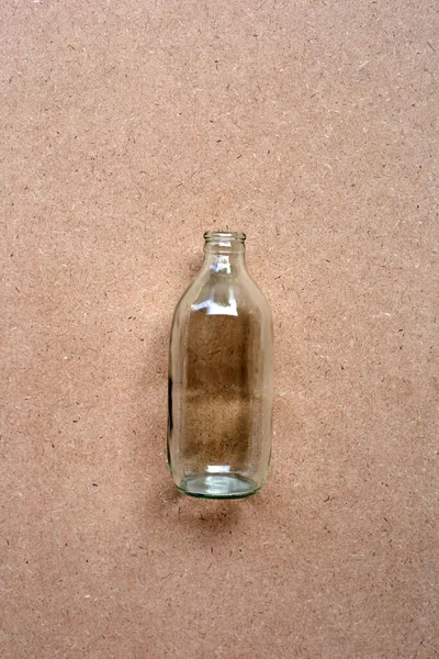 Butelka Szklana Brązowym Tle — Zdjęcie stockowe