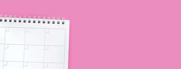 Calendar book on pink background. Work planning