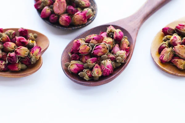Dried rose buds or petals for rose tea, herbal drink