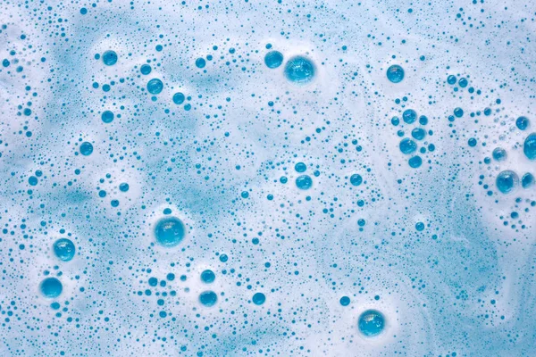 Blue water bubble. White soap foam