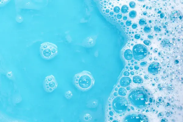 Blue water bubble. White soap foam