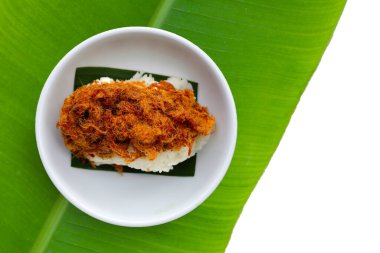 Yapışkan pilav ve diş ipi.