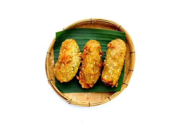 stock image Deep-fried banana rolls with unripe rice grain