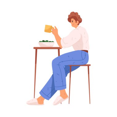 Kahve ya da çay içen ve mutfakta kahvaltı yapan bir adam. İzole edilmiş erkek şahıs günlük rutini ve sabah programı. Bir fincan sıcak içecekle gülen mutlu insan günün tadını çıkarıyor.