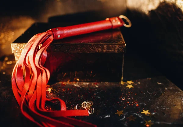 Bdsm Toys Red Leather Whip Black Background Red Glitter — Stock Photo, Image