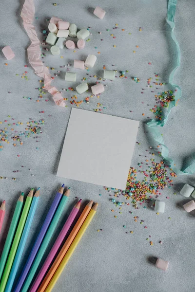 Mockup Sheet White Paper Gray Background Pencils Colored Confetti Mockup — Stock fotografie
