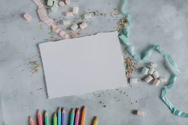 Mockup Sheet White Paper Gray Background Pencils Colored Confetti Mockup — Zdjęcie stockowe