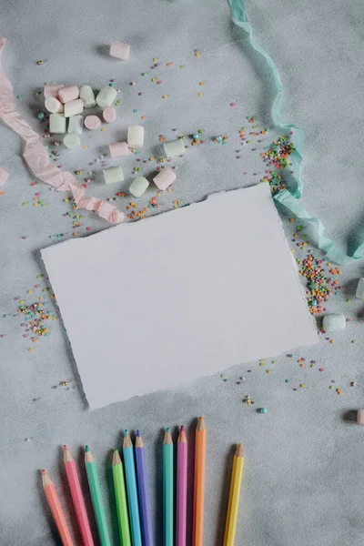 Mockup Sheet White Paper Gray Background Pencils Colored Confetti Mockup — Zdjęcie stockowe