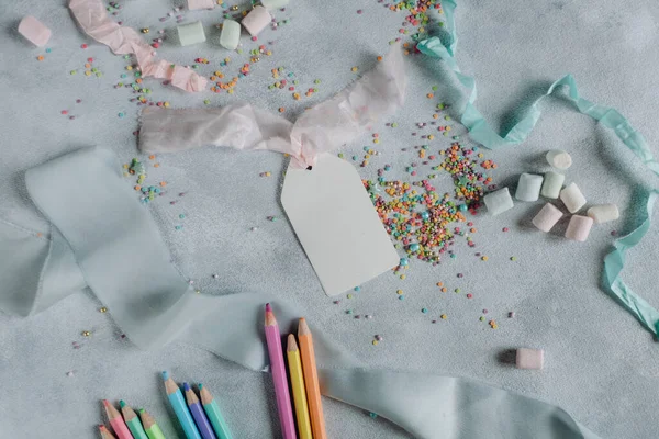 White Paper Sheet Mockup Gray Background Pencils Colored Confetti Tag — Fotografia de Stock