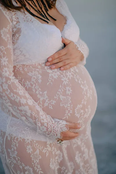 Pregnant woman in white dress, Pregnancy and wedding