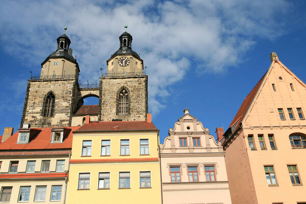 St.Mary's church and houses around the market square in Lutherstadt Wittenberg Germany