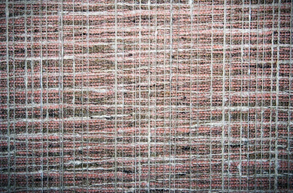 Old fabric background on a wall