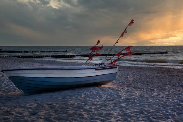 stock image Old fishing boat on the beach