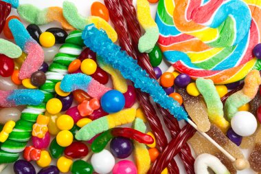 Macro Photography. Many different yummy candies and jellies as background, top view