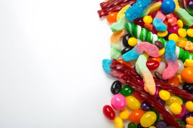 Macro Photography. Many different yummy candies and jellies as background, top view