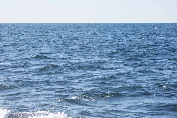 Ripples on surface of beautiful ocean water background