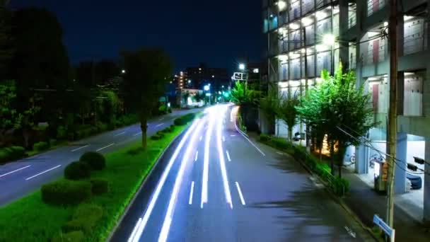 東京のダウンタウンの通りで渋滞の夜のタイムラプス 西東京地区東伏見東京都09 2022ここでは東京の街です 高品質4K映像 — ストック動画