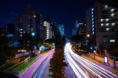 A night traffic jam at the city crossing in Tokyo wide shot. High quality photo. Nakano district Higashinakano Tokyo Japan 10.11.2022 Here is an electric quarter in Tokyo. It is center of the city in