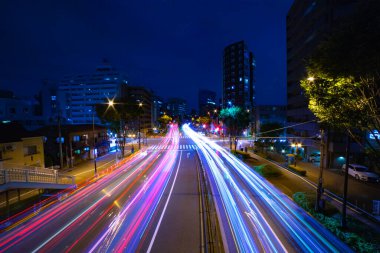 A night traffic jam at the city crossing in Tokyo wide shot. High quality photo. Nakano district Higashinakano Tokyo Japan 10.11.2022 Here is an electric quarter in Tokyo. It is center of the city in