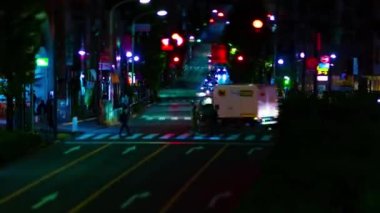 A night timelapse of the miniature traffic jam in Tokyo. High quality 4k footage. Toshima district Mejiro Tokyo Japan 10.27.2022 Here is a city street in Tokyo. 