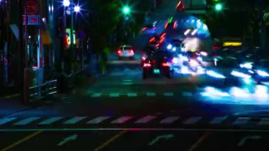A night timelapse of the traffic jam at the downtown street in Tokyo. High quality 4k footage. Toshima district Mejiro Tokyo Japan 10.27.2022 Here is a city street in Tokyo. 
