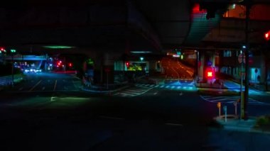 A night timelapse of the traffic jam at the downtown street in Tokyo. High quality 4k footage. Toshima district Mejiro Tokyo Japan 10.27.2022 Here is a city street in Tokyo. 