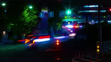 A night timelapse of the traffic jam at the downtown street in Tokyo. High quality 4k footage. Toshima district Mejiro Tokyo Japan 10.27.2022 Here is a city street in Tokyo. 