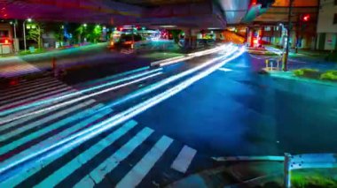 A night timelapse of the traffic jam at the downtown street in Tokyo. High quality 4k footage. Toshima district Mejiro Tokyo Japan 10.27.2022 Here is a city street in Tokyo. 