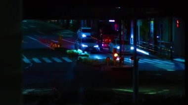 A night timelapse of the traffic jam at the downtown street in Tokyo. High quality 4k footage. Toshima district Mejiro Tokyo Japan 10.27.2022 Here is a city street in Tokyo. 