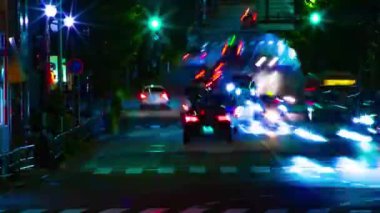 A night timelapse of the traffic jam at the downtown street in Tokyo. High quality 4k footage. Toshima district Mejiro Tokyo Japan 10.27.2022 Here is a city street in Tokyo. 