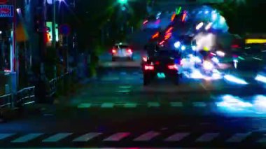 A night timelapse of the traffic jam at the downtown street in Tokyo. High quality 4k footage. Toshima district Mejiro Tokyo Japan 10.27.2022 Here is a city street in Tokyo. 