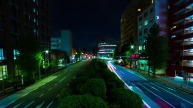 A night timelapse of the traffic jam at the downtown street in Tokyo. High quality 4k footage. Toshima district Mejiro Tokyo Japan 10.27.2022 Here is a city street in Tokyo. 