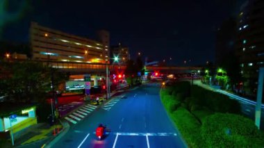 A night timelapse of the traffic jam at the downtown street in Tokyo. High quality 4k footage. Toshima district Mejiro Tokyo Japan 10.27.2022 Here is a city street in Tokyo. 