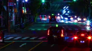 A night timelapse of the traffic jam at the downtown street in Tokyo. High quality 4k footage. Toshima district Mejiro Tokyo Japan 10.27.2022 Here is a city street in Tokyo. 