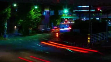 A night timelapse of the traffic jam at the downtown street in Tokyo. High quality 4k footage. Toshima district Mejiro Tokyo Japan 10.27.2022 Here is a city street in Tokyo. 